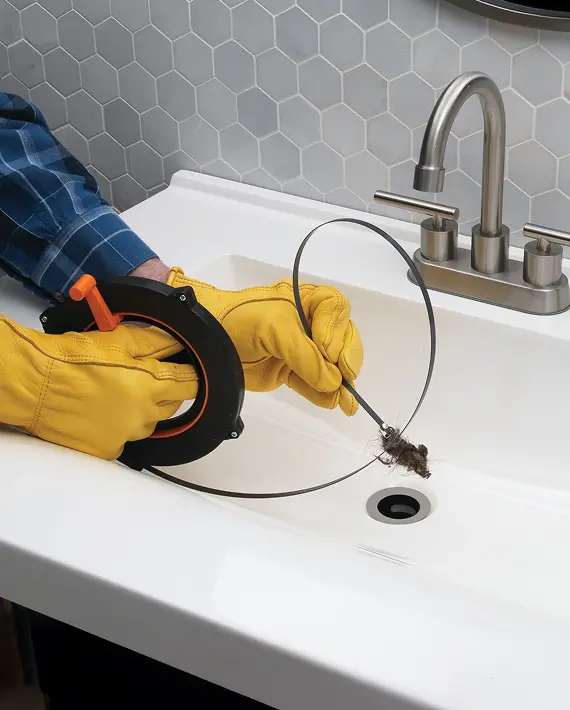 Clearning a sink drain